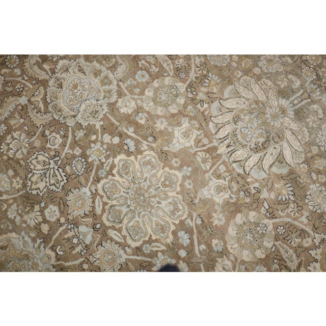 An early 20th-century oversize Persian Kashan rug Measures: 11'6'' x 19'3''