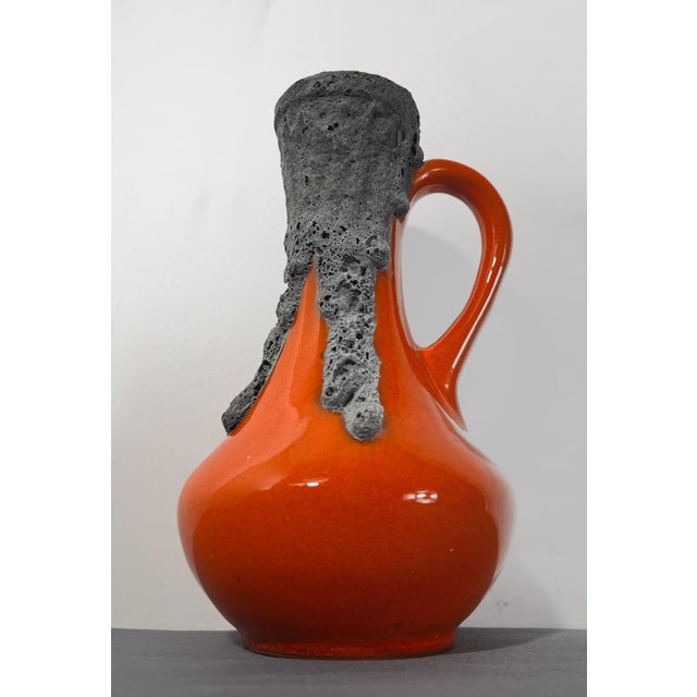 Attributed to Roth Keramik, this striking West German Fat Lava ceramic ewer captures the bold sculptural aesthetic that...