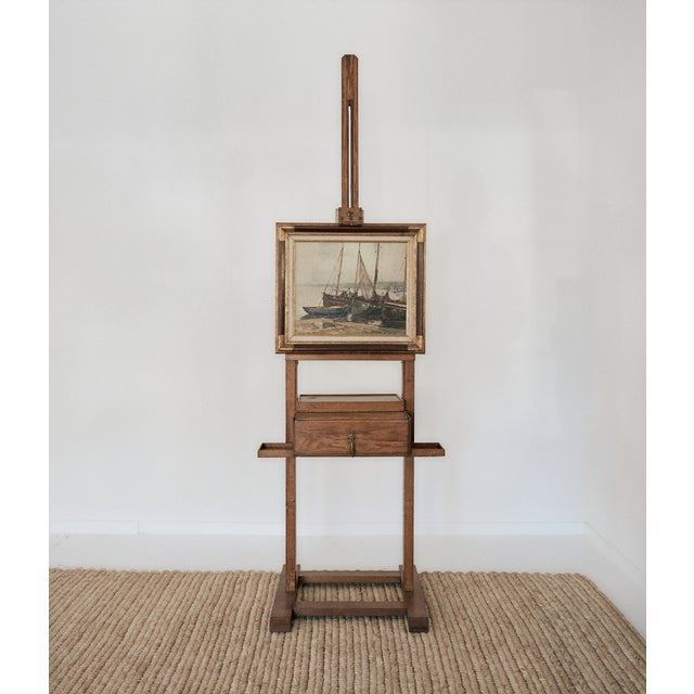Vintage French adjustable painters easel. This elegant wooden easel has a functioning drawer with a beautiful brass knob,...
