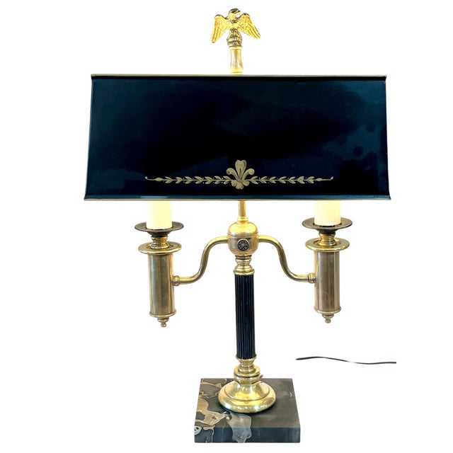 Vintage black and gold tole shade lamp with brass and marble base. Hand painted gold feather detailing on the front of the...