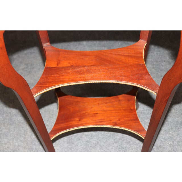 Elevate your interior with this exquisite bronze-mounted end table, a refined accent piece that blends classical European...