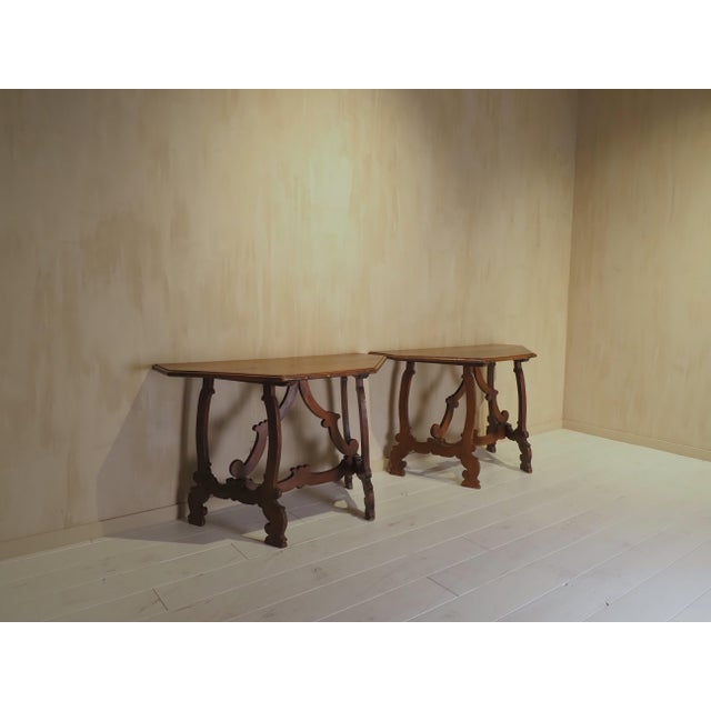 A Remarkable Pair of 18th-Century Italian Console Tables This elegant pair of 18th-century Italian console tables...