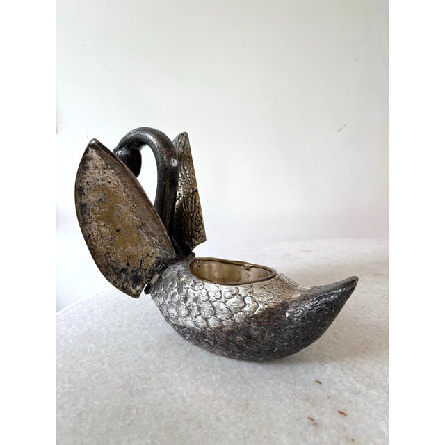 Rare silver plated Swan centerpiece with hinged wings.