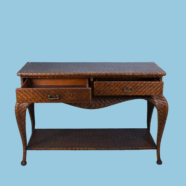 A Ming-style credenza wrapped in rattan, offering generous storage with a light, textural presence. The wrapped finish and...