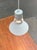 A simple pendant lamp by the Danish manufacturer Louis Poulsen. The lamp consists of two elements: a base and the shade....