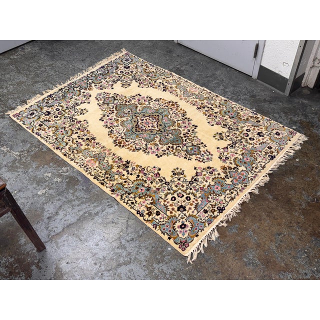 Design Plus Gallery presents a 4ft 3in x 6ft 1in Aubusson Area Rug. The hand woven rug has a light yellow background with...