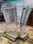 Jeffery Bigelow acrylic and bronze dining table. Dimensions - Height: 28 in. (71.12 cm) Width: 33 in. (83.82 cm) Depth: 25...