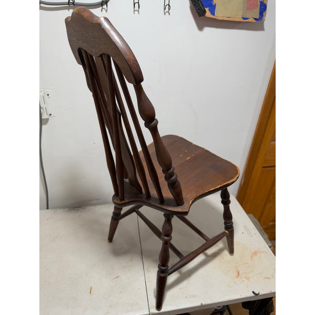 The product is an Antique Brace Back Windsor Chair with a Grooved Seat. It belongs to the Antiques and Furniture...