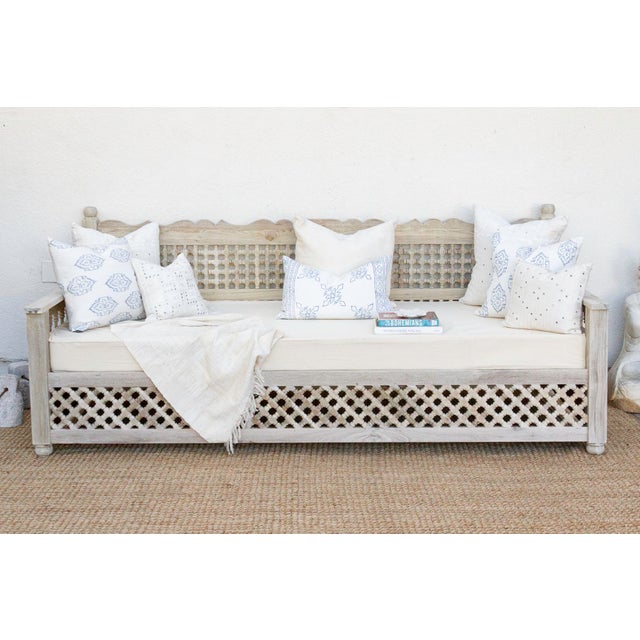 Prepare for unparalleled relaxation with this magnificent Moroccan-inspired lounge daybed, gracefully extending to an...
