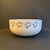 Vintage White Mixing bowl with pink and blue floral motif decorating the rim, made by R. B. Bernarda out of Portugal. This...