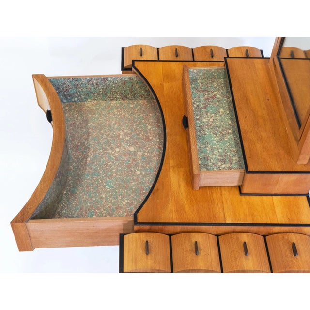 A bespoke made Art Deco revival London plane & ebony dressing table by Francesca Graham. British. Circa 1984. The dressing...