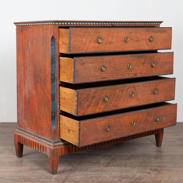 Early 19th century Danish chest of four drawers crafted in pine. The chest retains its original painted finish in tones of...