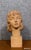 Terracotta bust of a young girl, Art Deco period, by J.C. Guéro, circa 1940 Signed on the back of the neck H38 x 20 x 20 cm