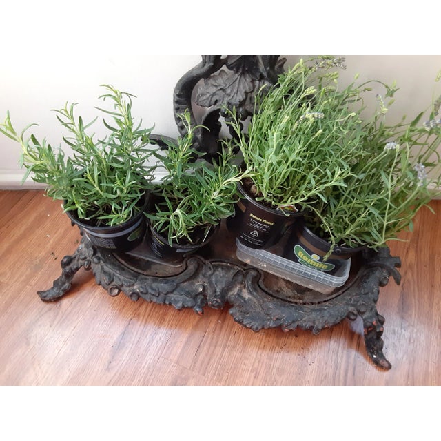 Genuine antique from late 19th to early 20th c. Victorian or Art Nouveau periods. Heavy metal, can stand on it's own but...
