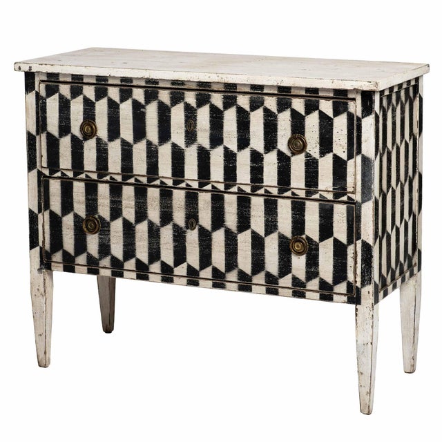 These 2-drawer chests were made by a husband and wife couple in Italy. He fabricates the chest using reclaimed wood and...