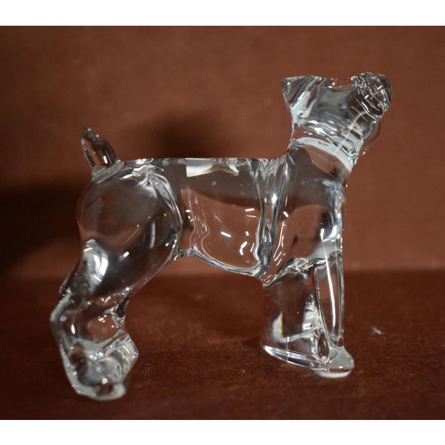 Vintage (1980's) Dog Figurine paperweight. Made by Baccarat. Clear Color. Made in France. The Measurements: 4.5"W x 2.5"D...