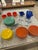 A vibrant, multi-colored vintage child’s toy tea set produced by J. Pressman & Co. during the 1930s–1940s Depression era....