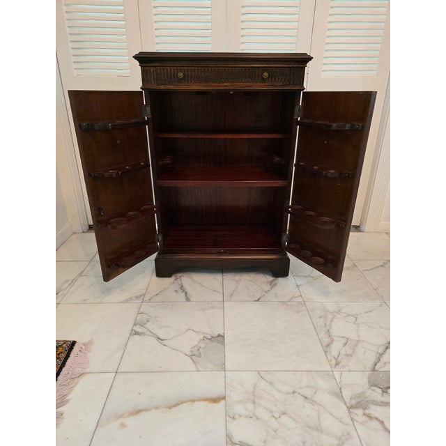 A very fine vintage original classic modern bar cart with double swing open doors and pull out drawer tray . Having superb...