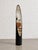 Mid Century Modern vintage full length lipstick mirror with a tall, elongated oval silhouette and a sculptural black body....