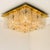 Mid-Century Modern textured ice glass light fixture by German manufacturer Kaiser, circa 1965. This ceiling light, often...