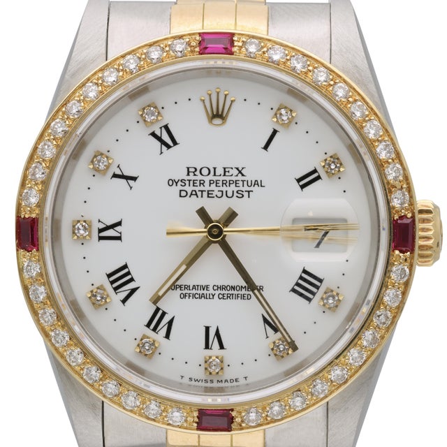 A Rolex Oyster Perpetual Datejust two-tone stainless steel and 18K yellow gold automatic wristwatch featuring an...