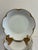 An elegant set of 10 antique Haviland & Co. Limoges porcelain bowls, each with a hand-applied gold scalloped rim and soft...