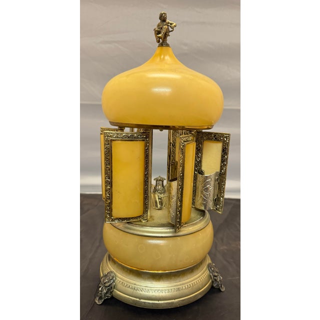 The Vintage Italian Onyx & Reuge Music Box Carousel Cigarette Lipstick Holder is a unique and luxurious decorative...