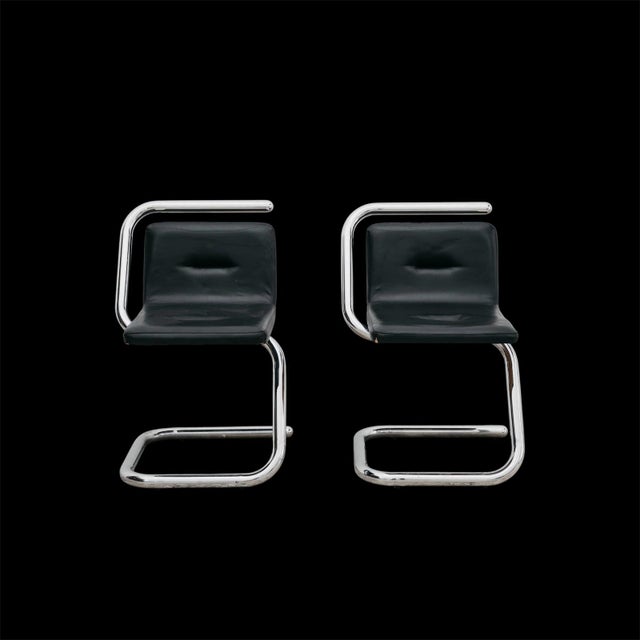 An elegant and exclusive pair of accent chairs attributed to designer Luigi Bardini, an extraordinary testament to the...