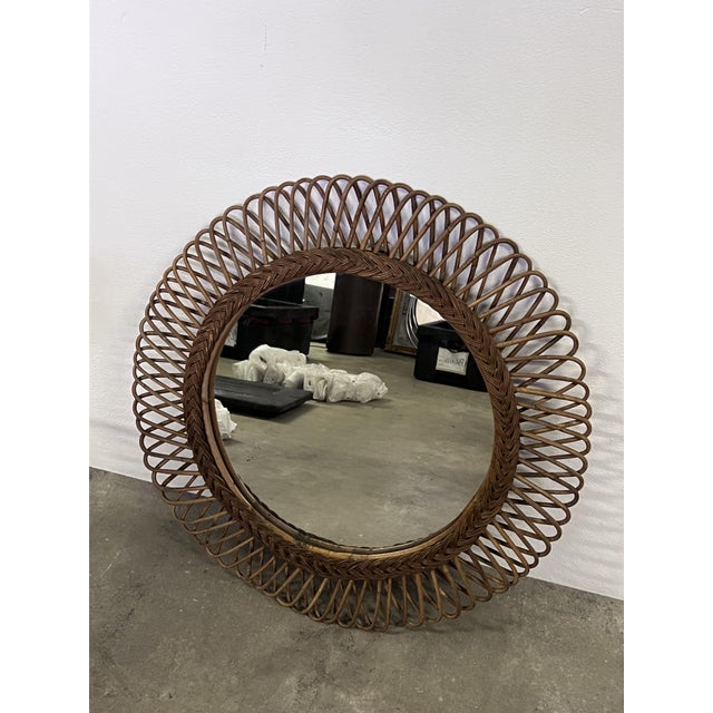 Round Wicker Mirror by Franco Albini, 1960s, in Very Good conditions. Designed 1960 to 1969 This piece is attributed to...