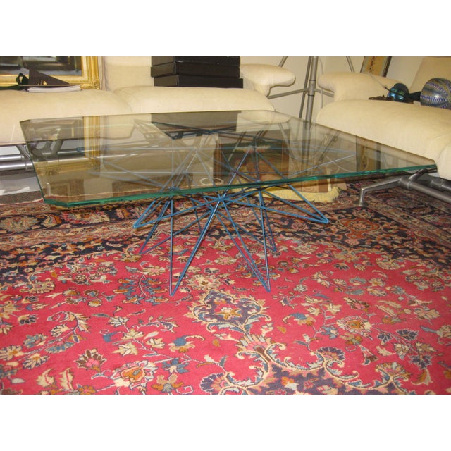 This is a beautiful Mid-Century Modern coffee table with a metal wire sculpture by designer rene brancusi. Made in the...
