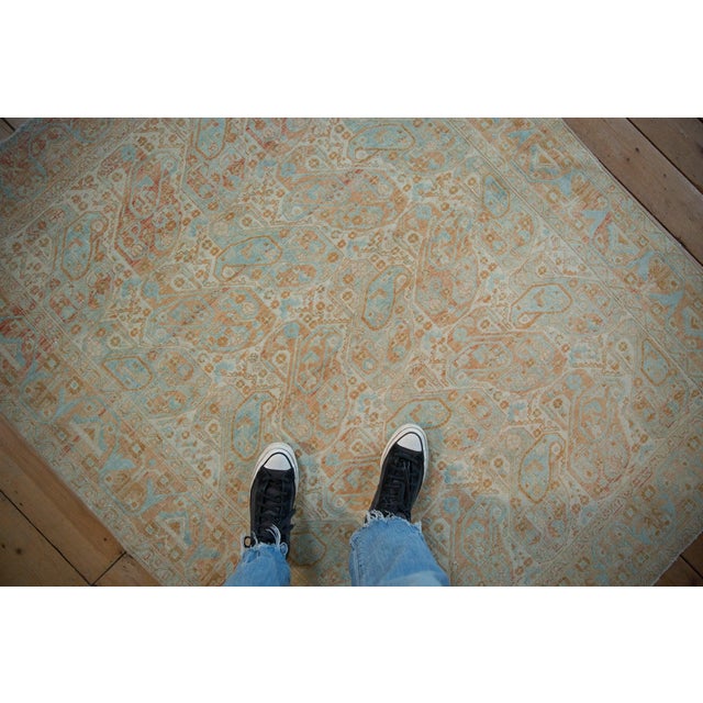 :: Covered field of concentric floral botehs arranged is rows and columns bearing inverted coloration and alternating...