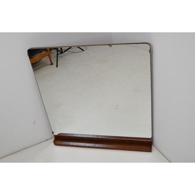 Made in Czechoslovakia. Made of Mirror, Wood. with aged patina. Original condition.