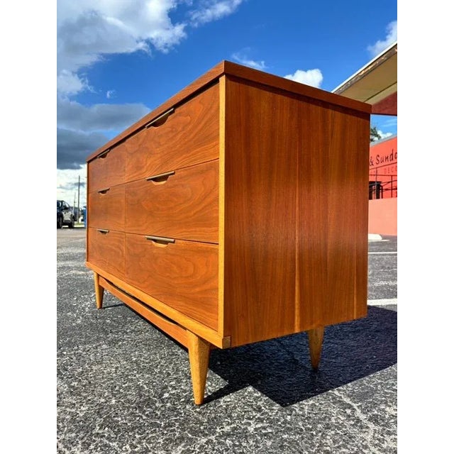 A Kent Coffey piece is as timeless as they come. The clean lines, tapered legs, beautiful wood grains, and solid frames....