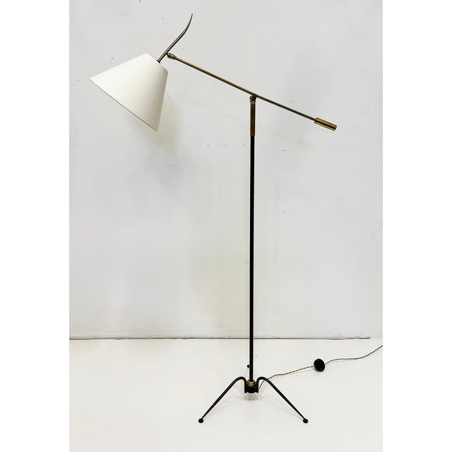 1950s Maison Lunel Pendulum Floor Lamps, 2 Available Offered for sale individually are 2 iconic 1950s French pendulum...