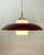 Danish mid-century pendant attributed to Bent Karlby, Denmark, circa 1950s–1960s. Executed in lacquered metal with a...