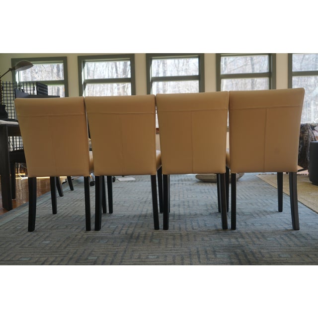 Crafted with a kiln-dried hardwood frame, this classic dining chair features top-grain leather upholstery for a refined,...