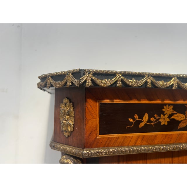 Napoleon iii display cabinet in veneered wood and blackened wood two glass doors on the front with a marquetry panel...