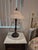 This is a matching pair of traditional-style banker/accent table lamps featuring an elegant combination of classic...