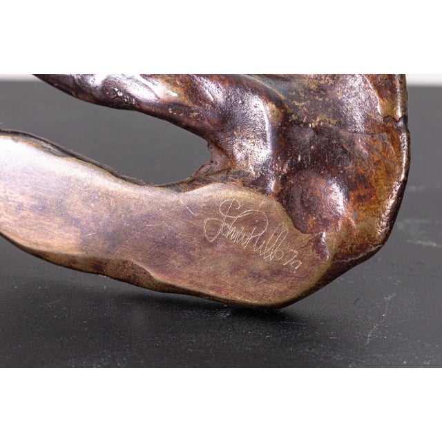 A contemporary cast bronze figurative sculpture titled “Diver” by John Mills. Etched signature in sculpture and dated...