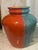 Blue and red vase custom made by artist Julia Elsas for Edie Parker.