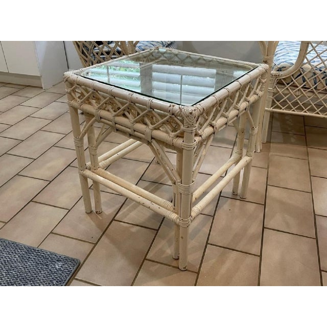 Set of three-piece 1960's nesting tables with lattice-style frames. The nesting tables are part of a Palm Beach single...
