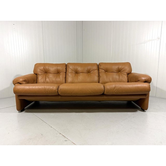 Three-seats sofa coronado by tobia & afra scarpa for b&b italy (marked). very comfortable sofa in cognac coloured leather....