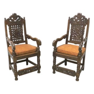 Pair of Antique Heavily Hand Carved Wooden Armchairs For Sale