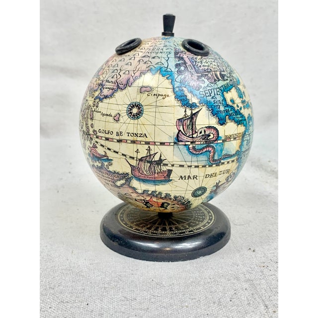 Vintage old world globe pen and pencil holder. Has room for 4 pens/pencils. Perfect to use in a home office. This is a...