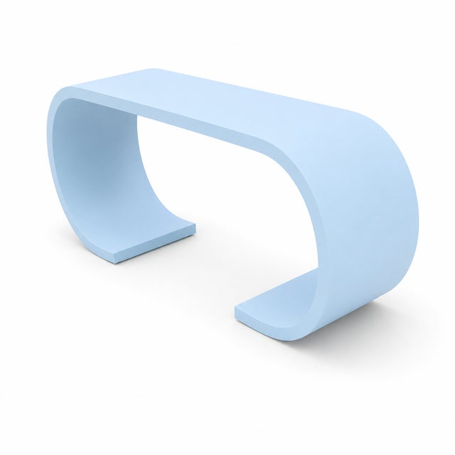 Mid century style waterfall console done in a baby blue.. Console is made of solid alder. Console has great lines and...
