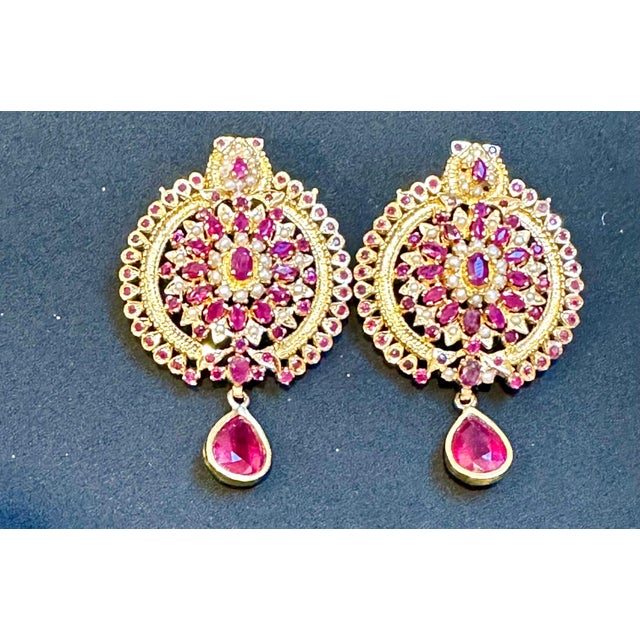 These exquisite stud earrings are a stunning example of fine jewelry craftsmanship. They are beautifully crafted with 22...