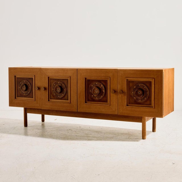 ‘Mózer’ cabinet from the 1970s, made and produced by the Hungarian Applied Arts Company. The cabinet is made of oak, with...