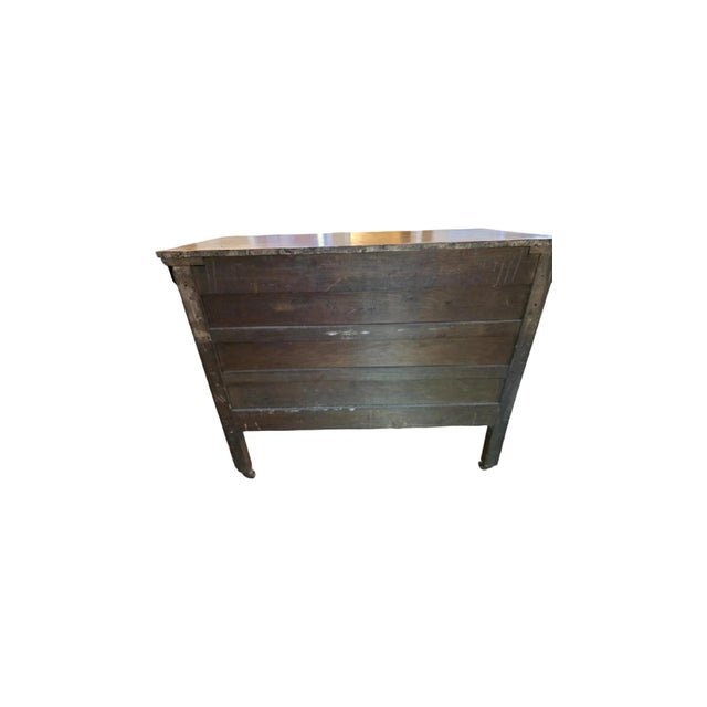 This handsome American Empire-style chest of drawers showcases the bold, curved lines and stately presence characteristic...