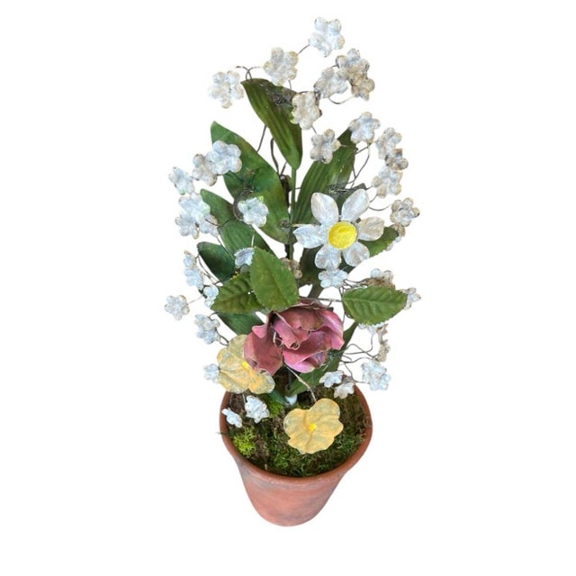 This exquisite hand-crafted floral sculpture made by unknown manufacturer , it features an intricate arrangement of...