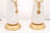 A signed pair of Italian Marbro table lamps featuring sculptural matte white ceramic bodies accented with gilt metal rope-...